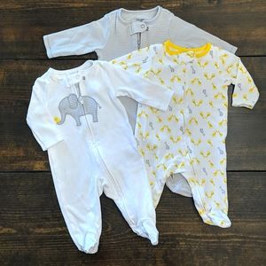 Set of 3 Carter's Simple Joys unisex (0-3m) zipper footie pajamas.